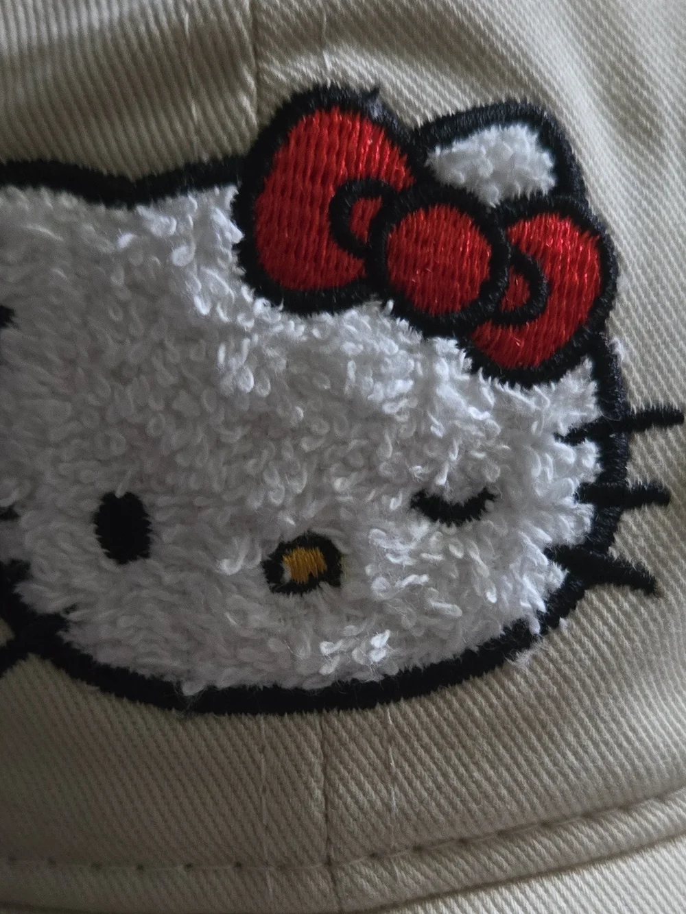 Sanrio Hello Kitty Embroidered Cream Hat with Red Bow